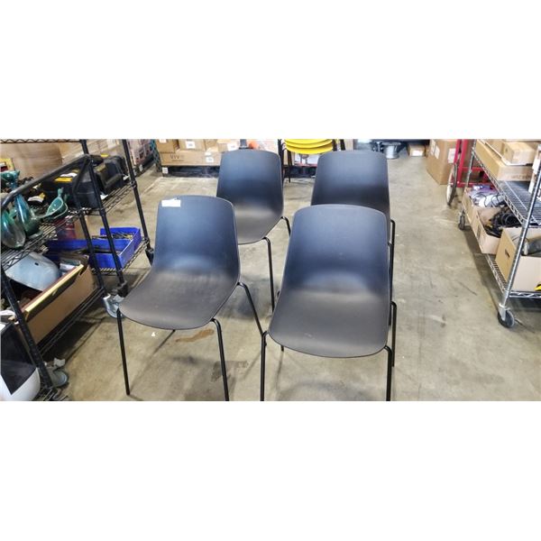 4 BLACK STACKING CHAIRS