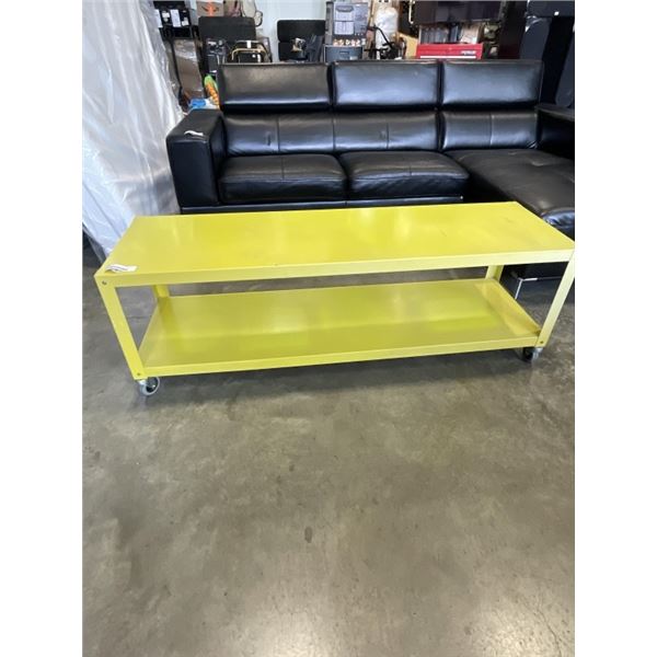 YELLOW METAL ROLLING COFFEE TABLE