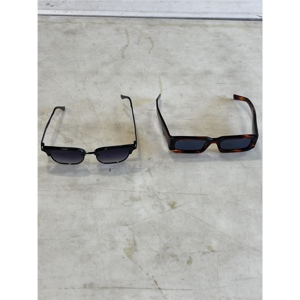 2 PAIRS OF PRADA SUNGLASSES. 1 HAS A CASE