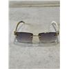 Image 2 : CARTIER SUNGLASSES IN CASE