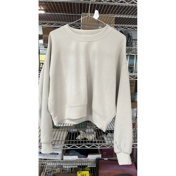 LULULEMON TOP. LADIES 4