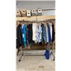 Image 1 : RACK OF ASSORTED CLOTHING: MOSTLY WORK CLOTHING *RACK NOT INCLUDED*