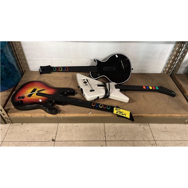 (3) GUITAR HERO GUITARS