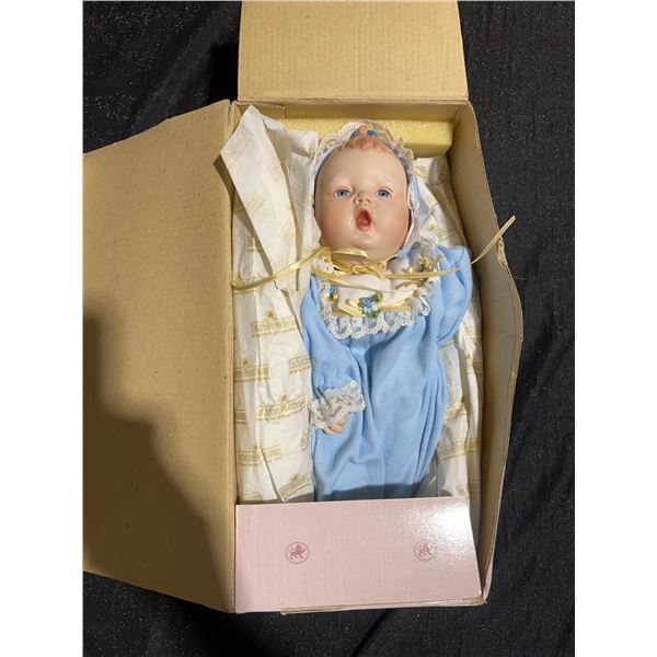 Ashton-Drake Galleries Porcelain Baby Doll in Blue Outfit