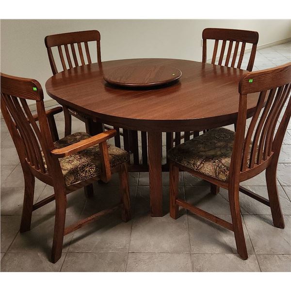 Oval Wooden Dining Table with Extension Leaves and Four Chairs