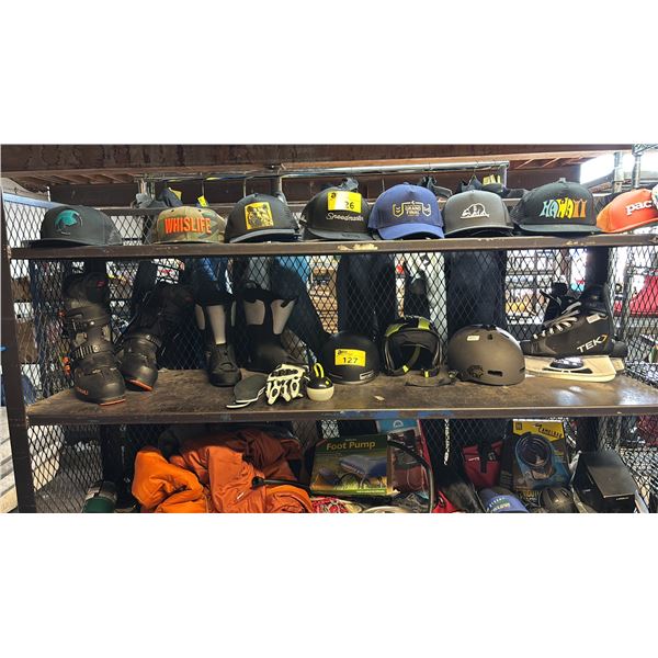 SHELF OF ASSORTED ITEMS INCLUDING SKEE SHOES, ICE-SKATING SHOES, HELMETS AND MORE