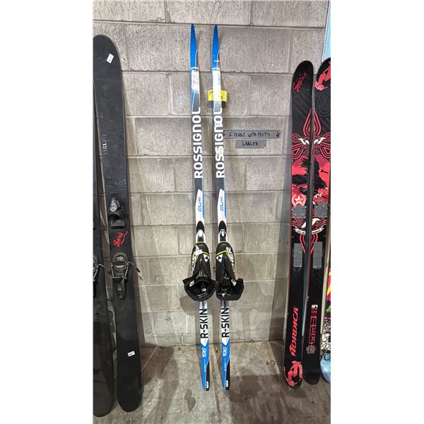 PAIR OF ROSSIGNOL SKIS WITH BOOTS