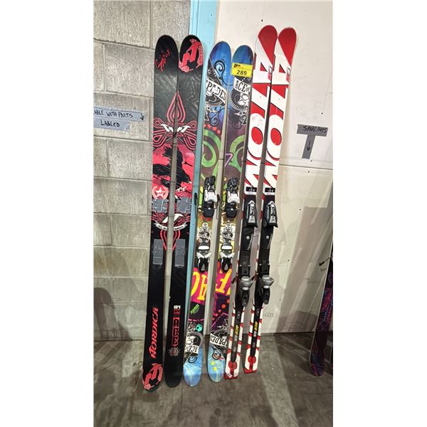 (2) PAIR OF NORDICA SKIS AND A PAIR OF ATOMIC SKIS