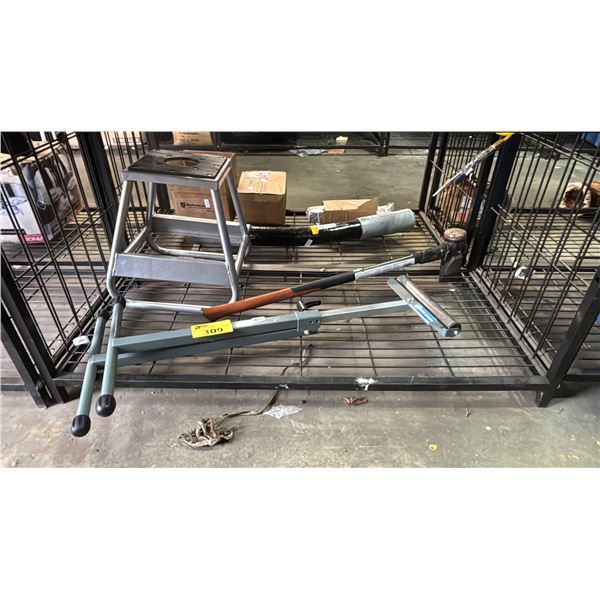 SHELF OF ASSORTED ITEMS INCLUDING METAL STOOL, HEAVY DUTY AXE AND METAL ROLLER