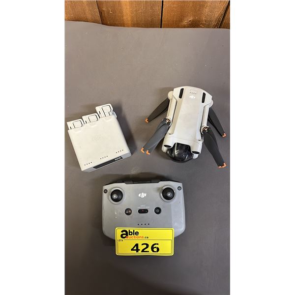 DJI ULTRALIGHT DRONE WITH 4 BATTERIES, BATTERY CHARGING DOCK & REMOTE (NO POWER CORDS, UNKNOWN