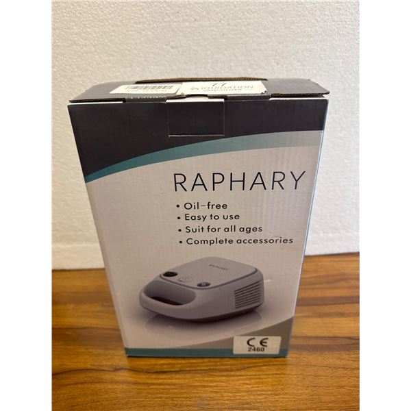 Brand new white RAPHARY Nebulizer Machine.