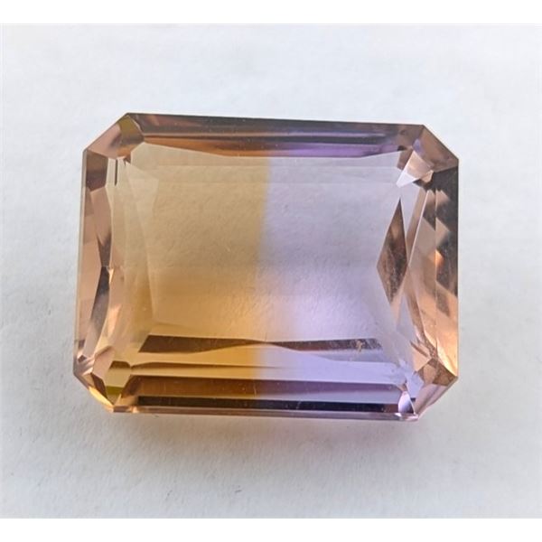 31.42 CT CERTIFIED BI-COLOUR AMETRINE GEMSTONE ($4,713 APPRAISAL)
