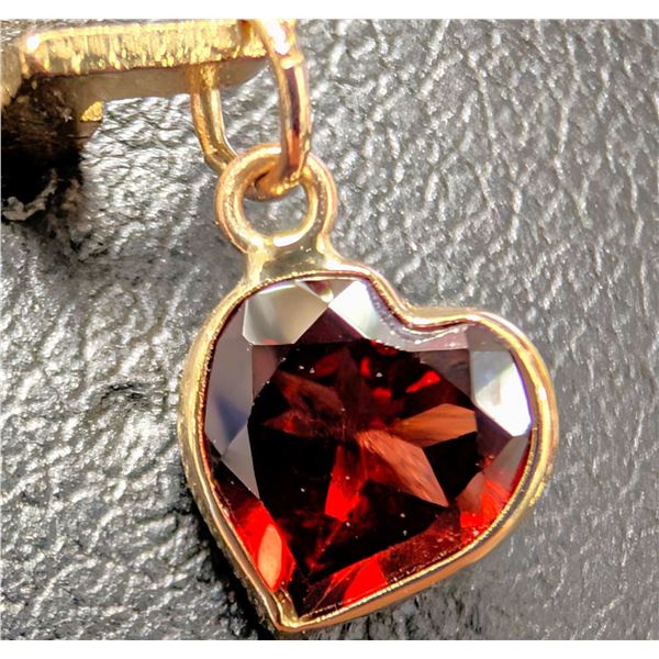 10K GARNET (0.85CT) PENDANT, SUGGESTED RETAIL VALUE $400