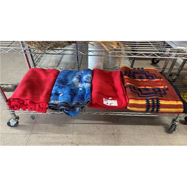 SHELF OF ASSORTED BLANKETS