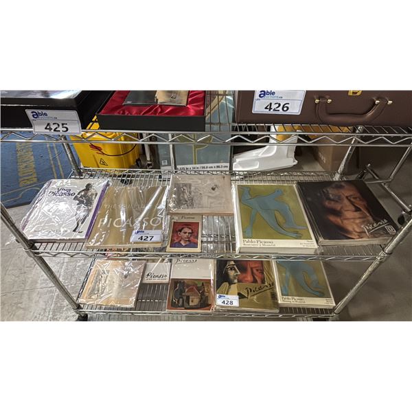 SHELF OF ASSORTED PABLO PICASSO BOOKS