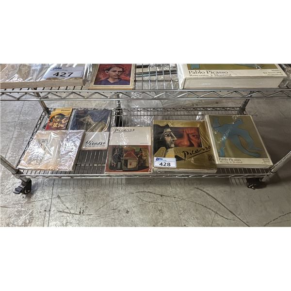 SHELF OF ASSORTED PABLO PICASSO BOOKS