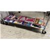 Image 1 : SHELF OF ASSORTED BARBIE CLOTHES *IN SEALED PACKAGES*
