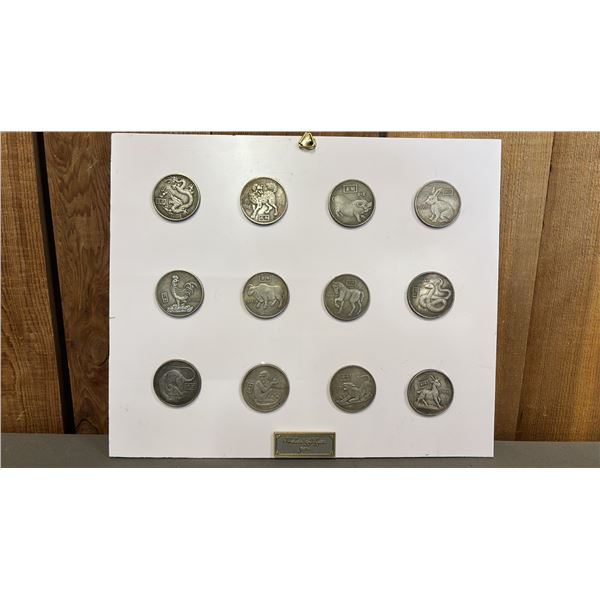 12 FRAMED ZODIAC COINS *AUTHENTICATION UNKNOWN*
