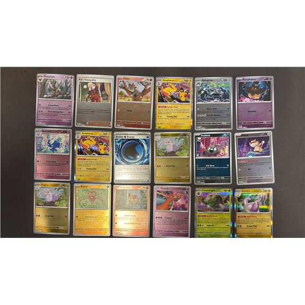 STACK OF ASSORTED POKEMON CARDS