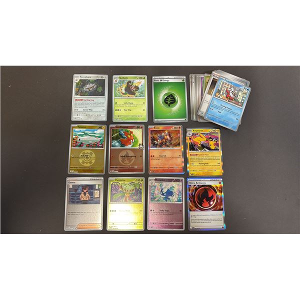 STACK OF ASSORTED POKEMON CARDS