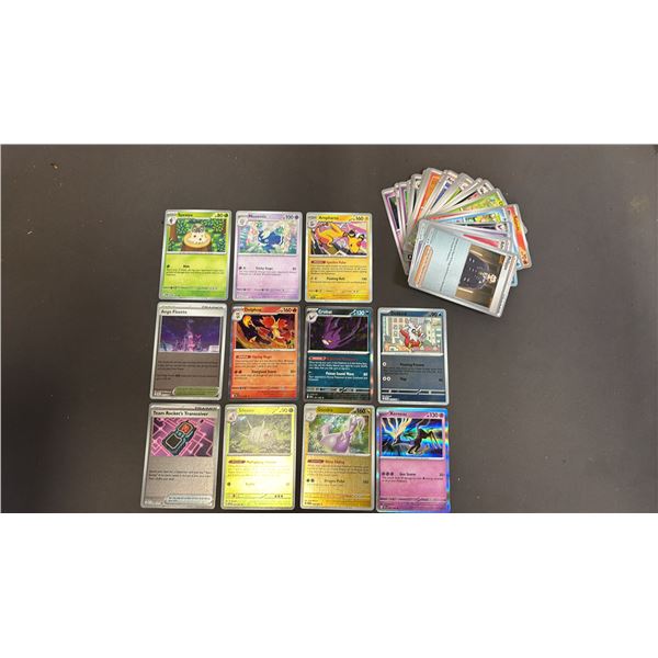 STACK OF ASSORTED POKEMON CARDS