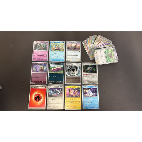STACK OF ASSORTED POKEMON CARDS