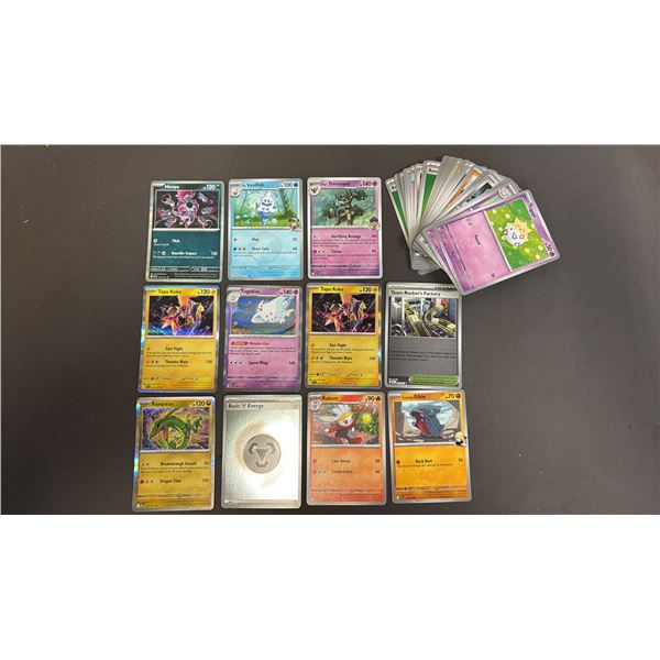STACK OF ASSORTED POKEMON CARDS