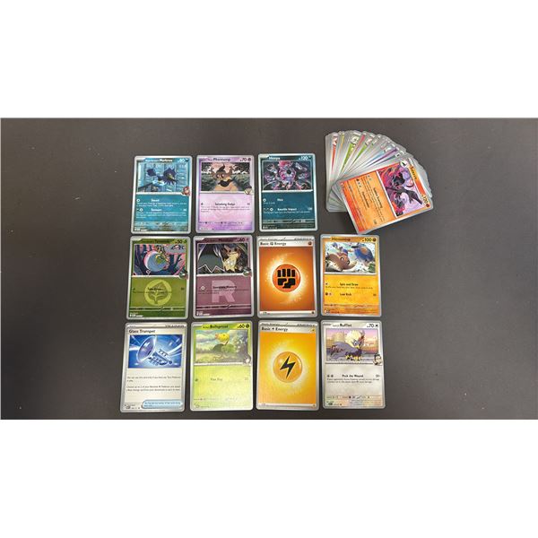 STACK OF ASSORTED POKEMON CARDS