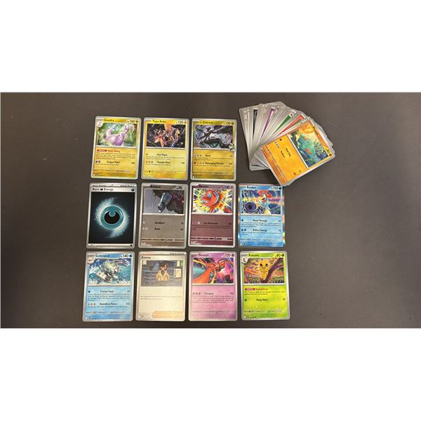 STACK OF ASSORTED POKEMON CARDS