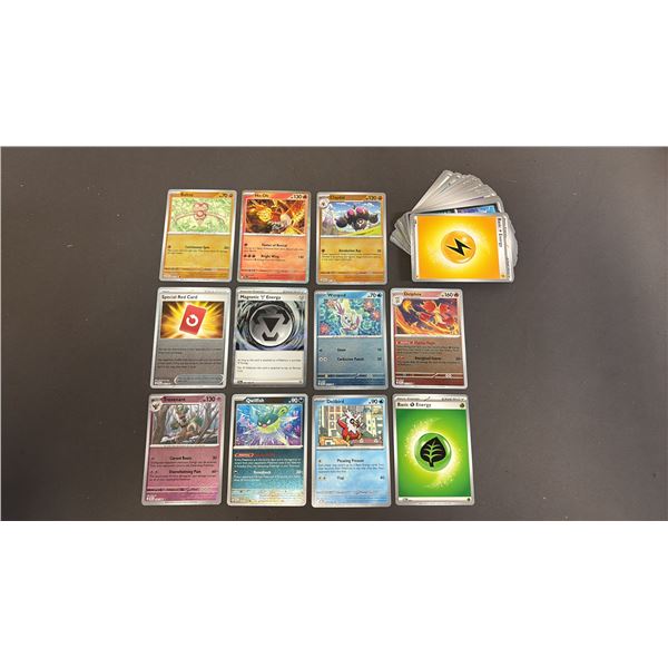 STACK OF ASSORTED POKEMON CARDS