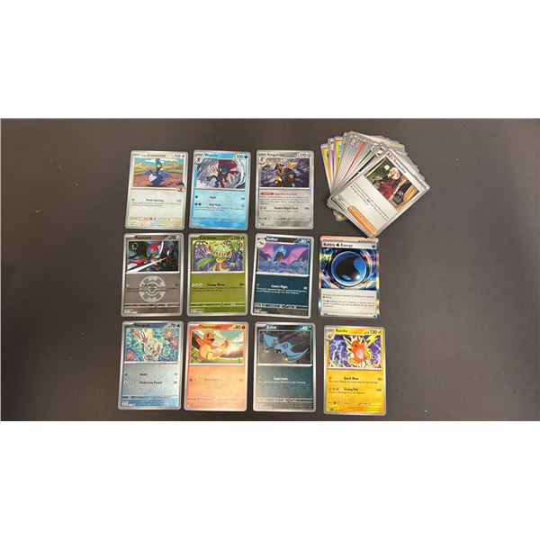 STACK OF ASSORTED POKEMON CARDS