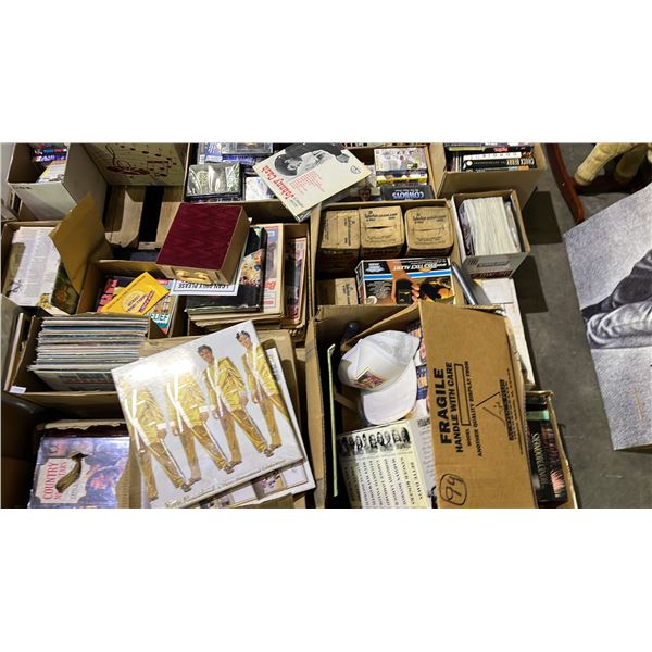 PALLET OF ASSORTED ITEMS INCLUDING ELVIS COLLECTABLE ITEMS, CASSETTES, NEWSPAPERS AND MORE
