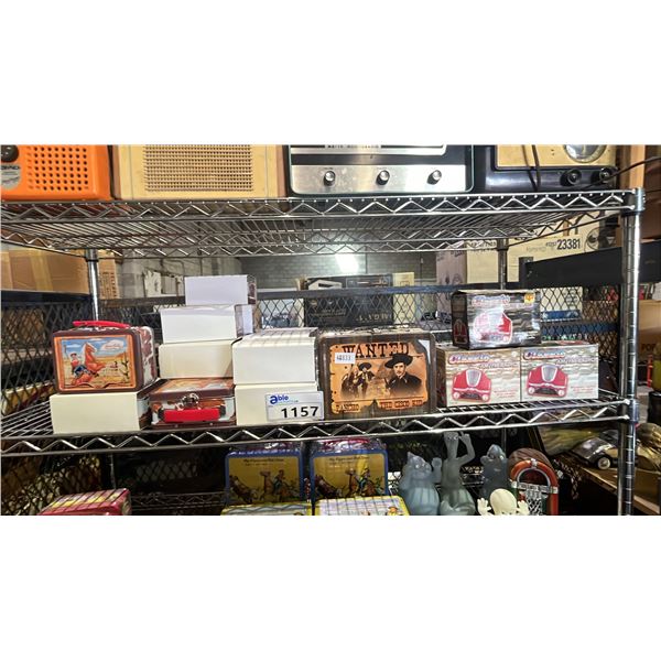 SHELF LOT OF ASSORTED VINTAGE COLLECTABLE TINS AND CLASSIC AM/FM RADIO