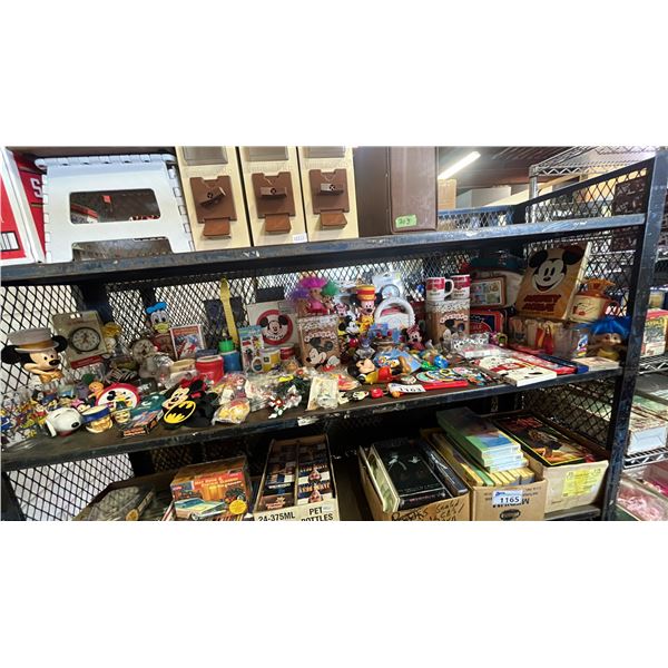 SHELF OF ASSORTED VINTAGE MICKEY MOUSE COLLECTABLE ITEMS INCL. MUGS, KEYCHAINS, FIGURINES AND MORE