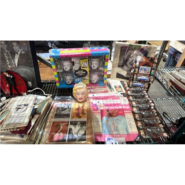 SHELF OF ASSORTED MERILYN MONROE COLLECTABLE ITEMS INCL. MUGS, TOY CAR, CARD AND MORE