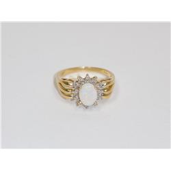 14k Gold Ring Opal With 25 Point Diamond