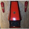 Image 6 : Wall-Mounted Red Metal Fireplace with Decorative Crest and Matching Sword Plaques