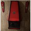 Image 7 : Wall-Mounted Red Metal Fireplace with Decorative Crest and Matching Sword Plaques