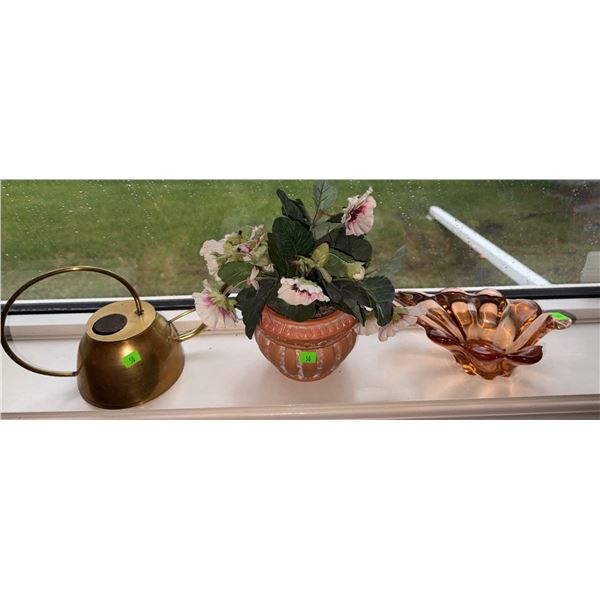 Brass Watering Can, Amber Glass Bowl, and Faux Floral Arrangement in Terracotta Pot
