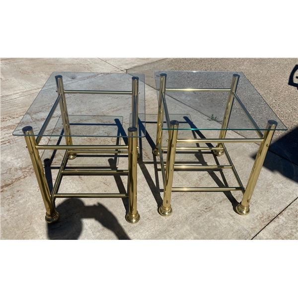 VINTAGE HOLLYWOOD REGENCY BRASS AND GLASS TWO-TIER SIDE TABLES