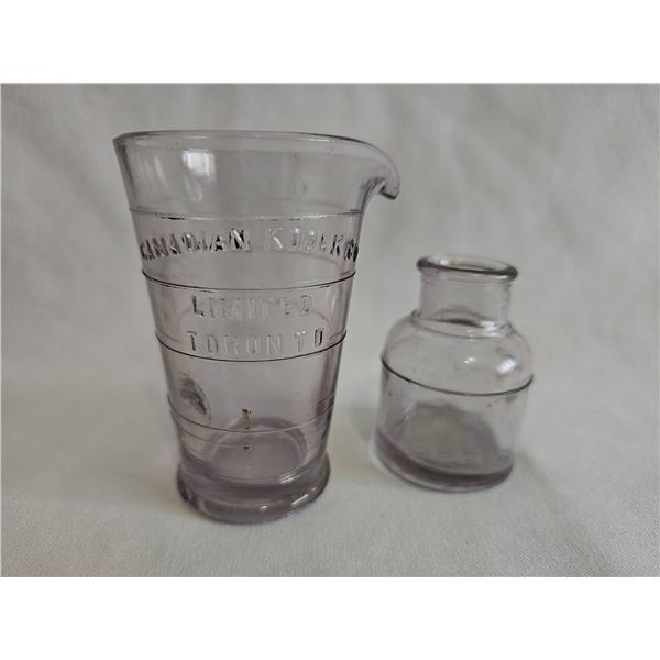 1940s Purple Glass Canadian Kodak Co. Glass Measuring Cup and Small Inkwell Bottle