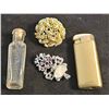Image 1 : Lot: Taylor's Perfume Bottle, Brass Lighter, Two Vintage Brooches.