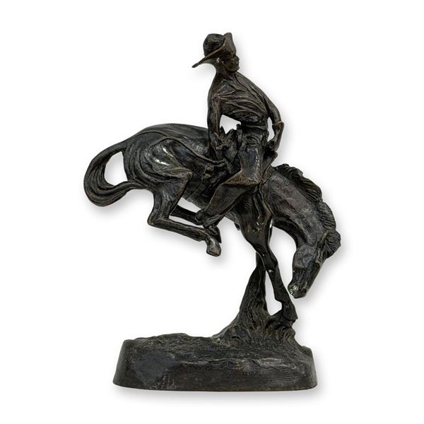 After Frederic Remington (American 1861-1909) Bronze Patinated Sculpture, The Outlaw, Signed