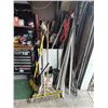Image 1 : Bin w/Asst. Yard Tools, Post Hole Digger, Conduit, PVC Pipes, Brooms, Dent Puller