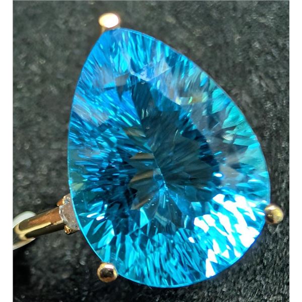 $650, 10k(2.4g), blue topaz (5.2ct)ring, size 6.25, retail value $650 ring r