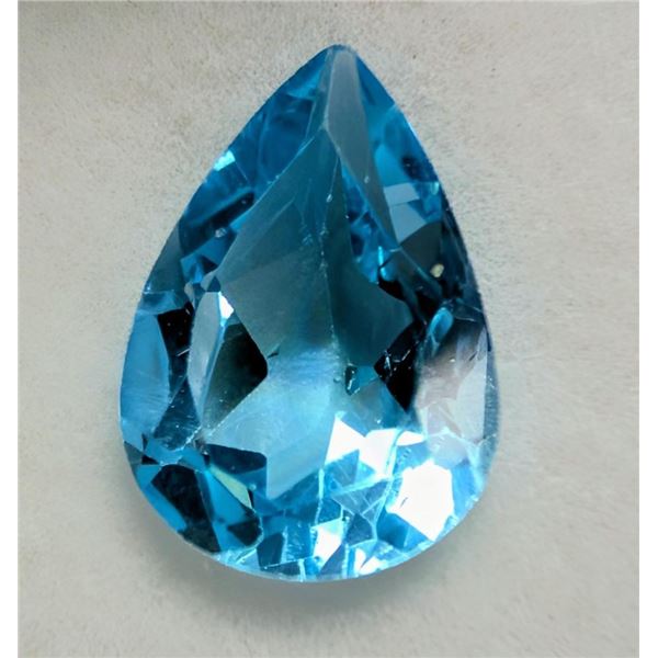 $100,  blue topaz (app 2ct) gemstone, retail value $100
