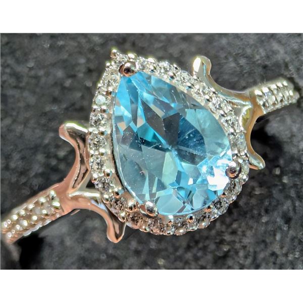$240, silver(3.44g),  blue topaz (1ct) ring, retail value $240