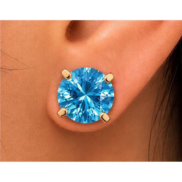 $1000, 14kblue topaz (4.5ct) earring, retail value $1000