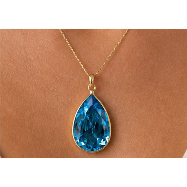 $500, 10k(1.05g),  blue topaz (4ct) pendant, retail value $500