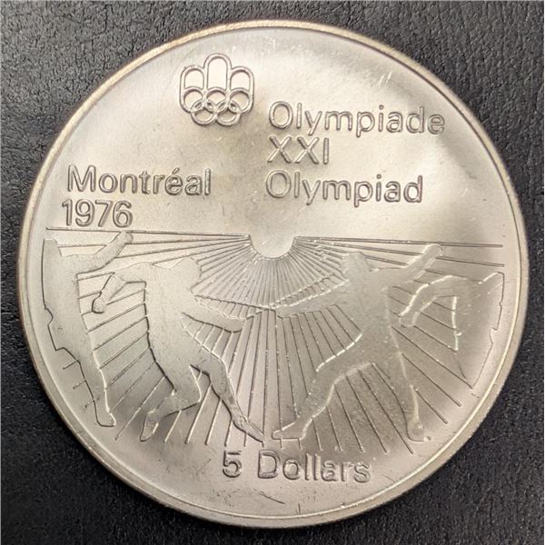 ., silver(24.47g), $5 olympic coin, retail value .